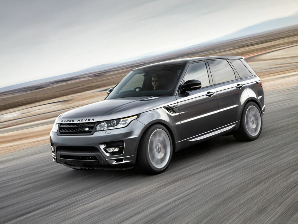 Stylish Range Rover Sport SUV Wallpaper - Dynamic Landscape Background