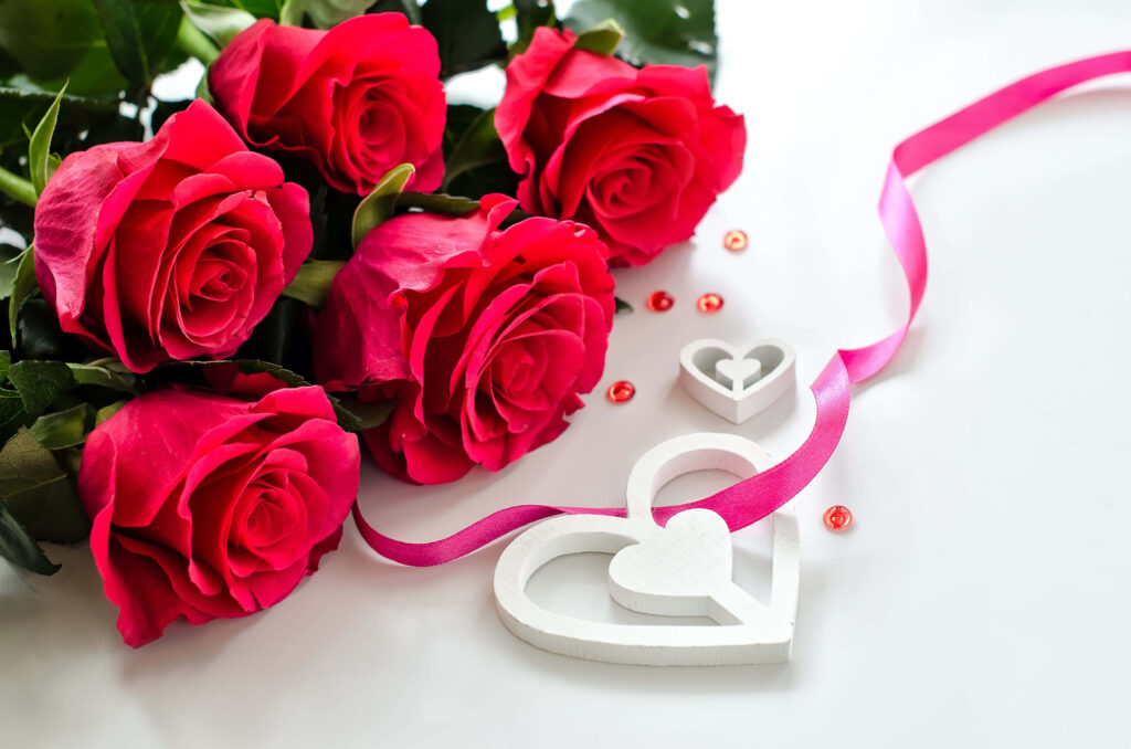 Elegant Red Roses Wallpaper with Pink Ribbon & Heart Decor