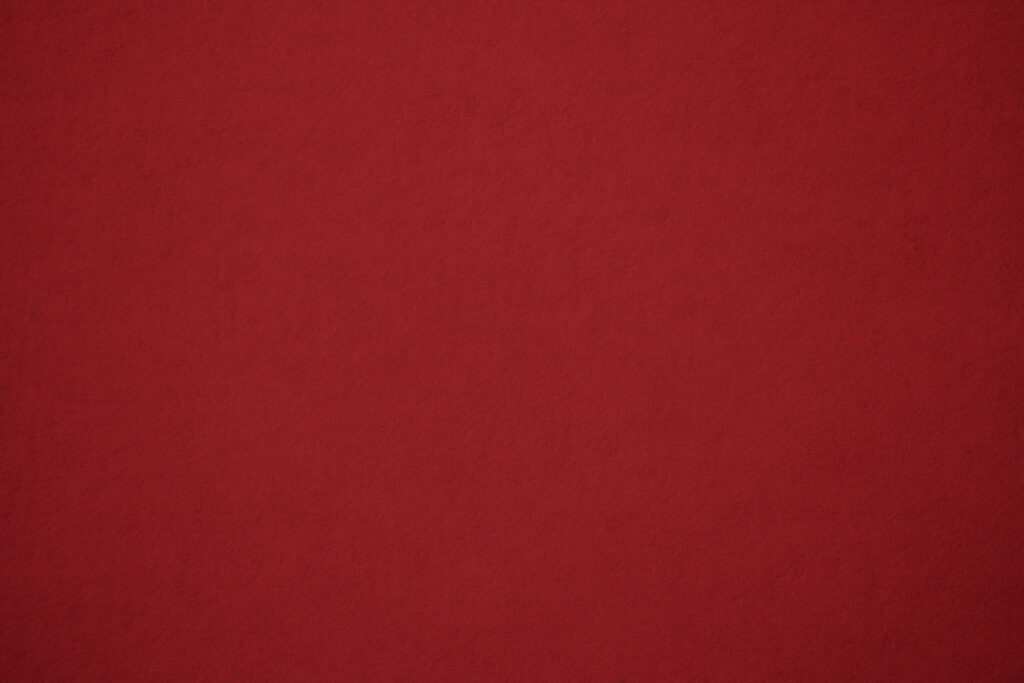 Elegant Red Textured Wallpaper: Bold & Vibrant Design Background