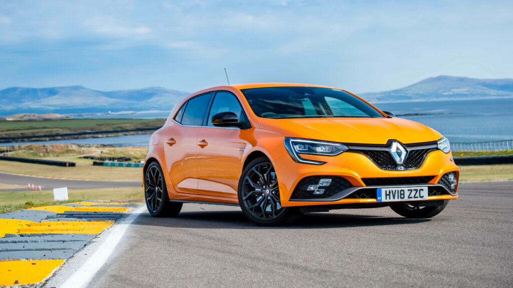 Elegant Renault Megane Wallpaper: Sporty Design on Scenic Road