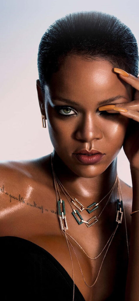 Rihanna Portrait Wallpaper: Elegant Style & Bold Charisma Background