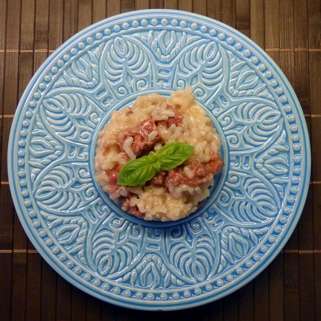 Elegant Risotto on Blue Plate: Beautiful Wallpaper Background