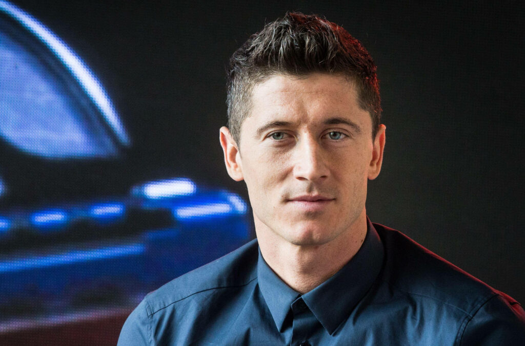 Elegant Robert Lewandowski Wallpaper in Formal Attire Background