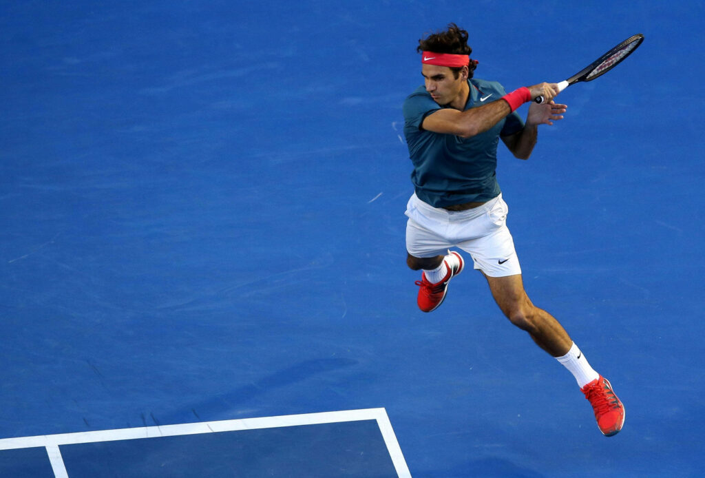 Roger Federer’s Elegant Jump Shot: Stunning Tennis Wallpaper