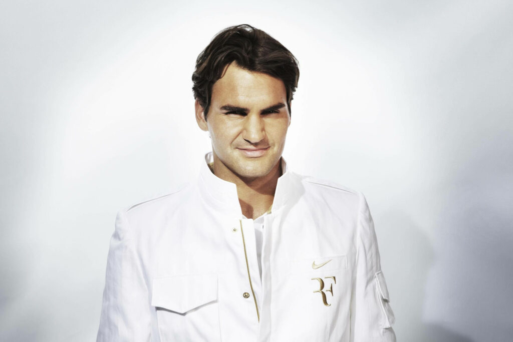 Elegant Wimbledon Wallpaper featuring Roger Federer in Stylish Outfit