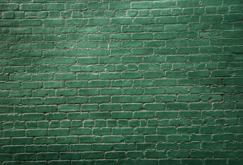 Elegant Rustic Green Brick Wall - Textured Wallpaper Background