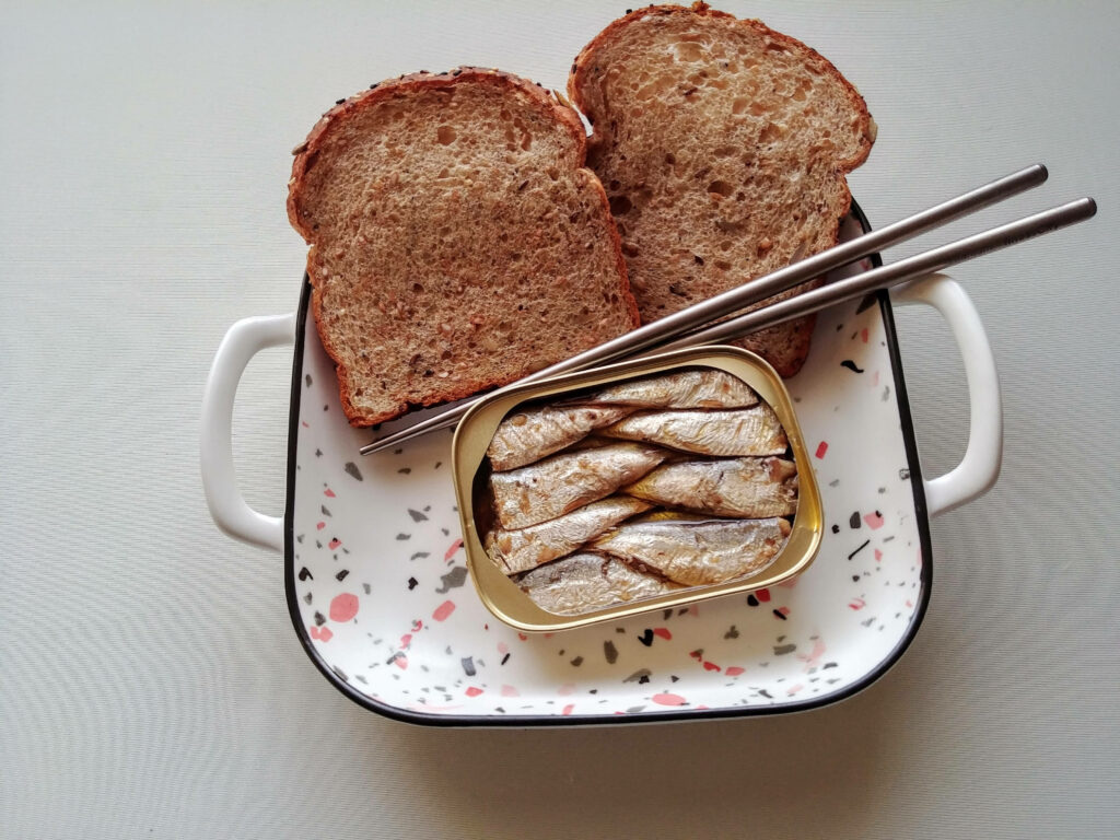 Elegant Sardines on Bread: Charming Wallpaper Background