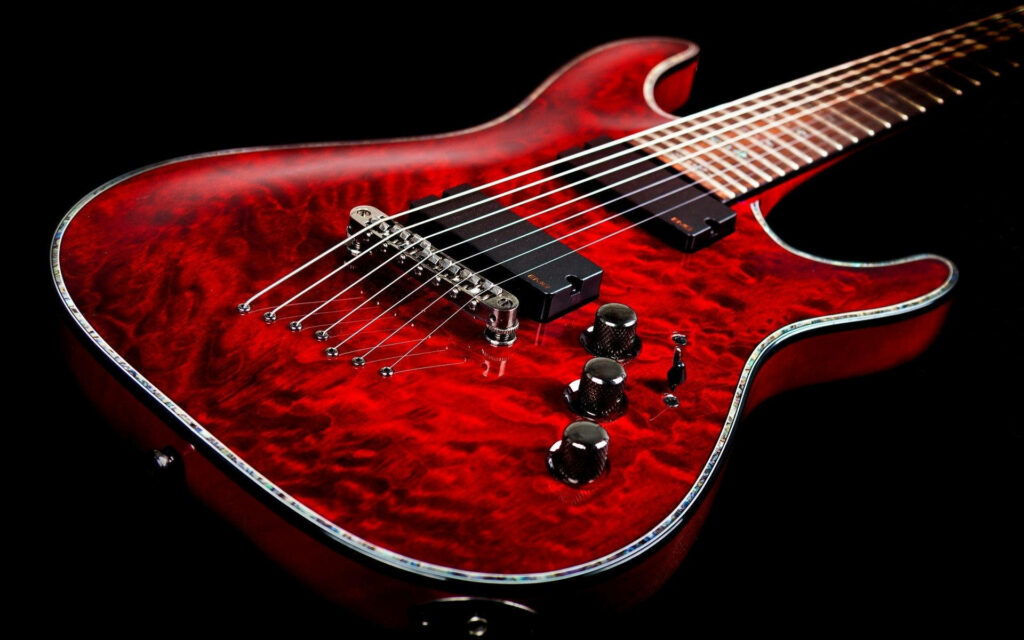 Elegant Seven-String Electric Guitar Wallpaper in Red Quilted Maple
