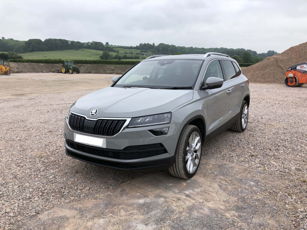 Sleek Skoda Karoq: Modern Design Meets Nature - Wallpaper Background