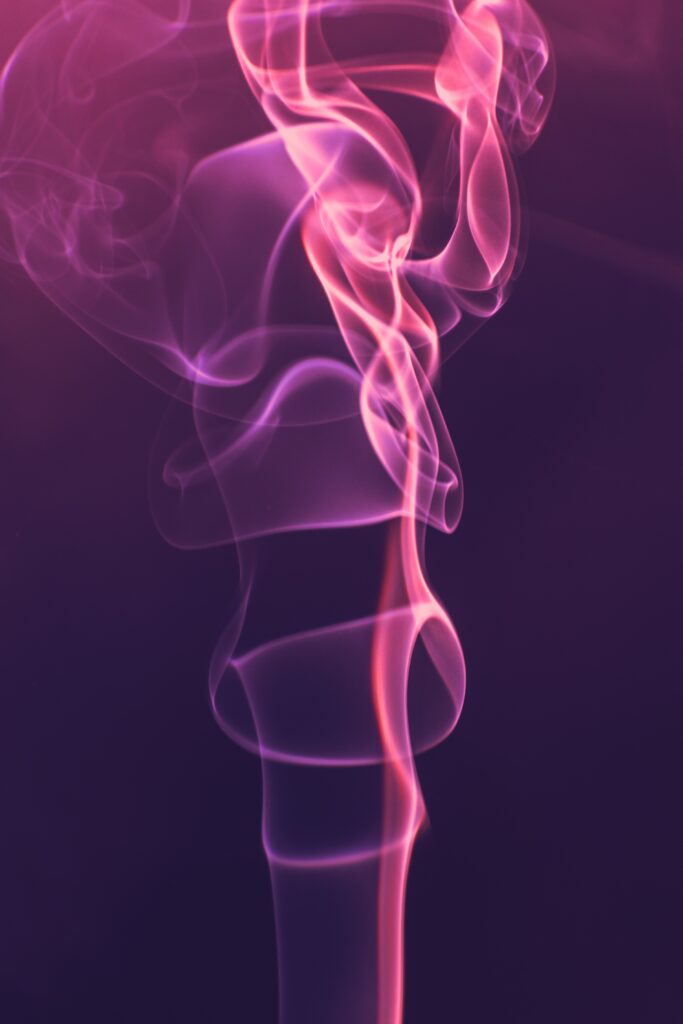 Elegant Smoke Wallpaper: Abstract Swirls on Deep Purple Background