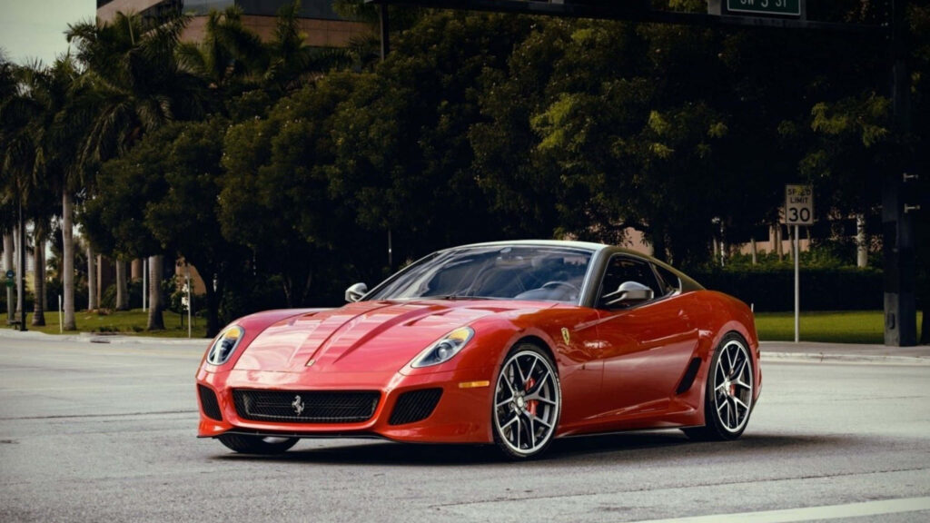 Red Ferrari 599 GTB Fiorano on a Road Background Wallpaper