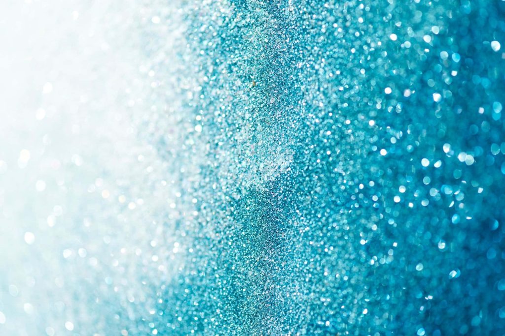 Teal glitter wallpaper with macro texture and blue gradient perfect for stylish laptop backgrounds