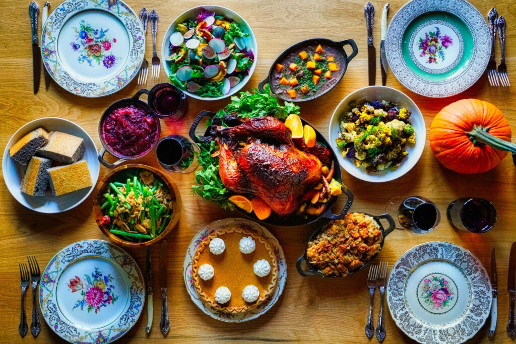 Elegant Thanksgiving Dinner with Roasted Turkey and Festive Sides Wallpaper