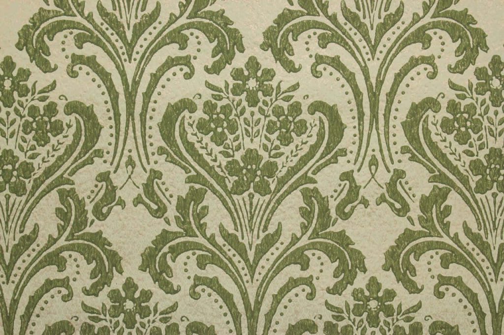 Elegant Victorian wallpaper with sage green damask floral motifs on textured cream background