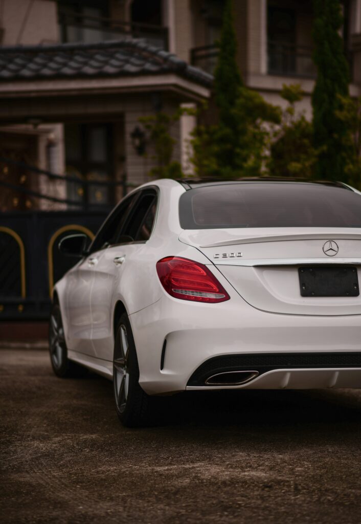 Elegant White Mercedes-Benz C300 Rear View Wallpaper - Sophisticated Design
