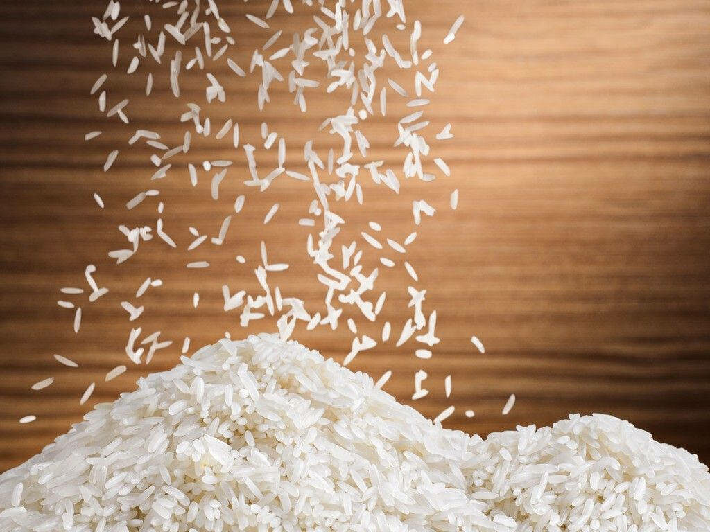 Elegant White Rice Wallpaper: Textured Grains on Wooden Background