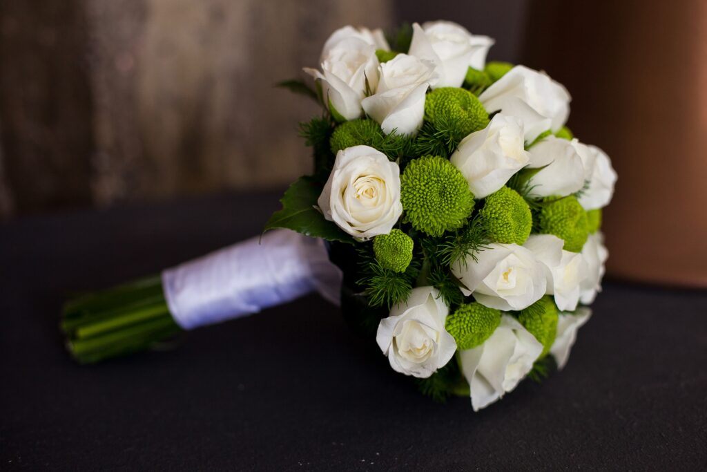 Elegant White Roses Bouquet Wallpaper for Wedding Charm Background