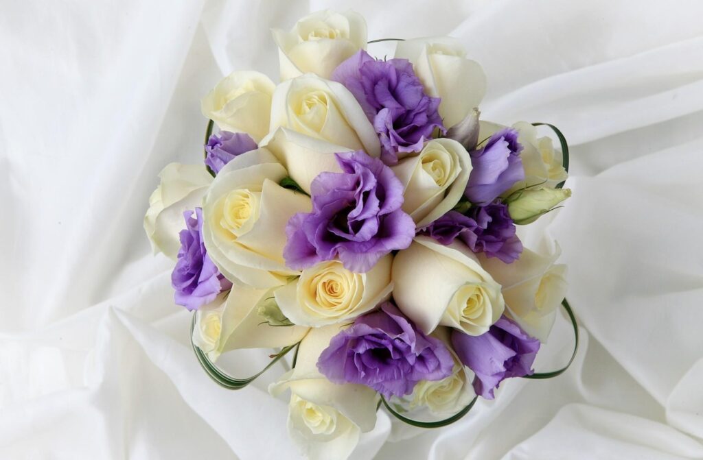 Elegant White Roses & Purple Lisianthus Bouquet Wallpaper Background