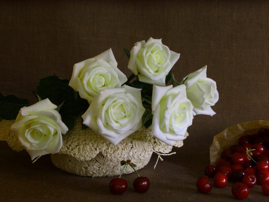Elegant White Roses with Ripe Cherries on Earthy Background Wallpaper