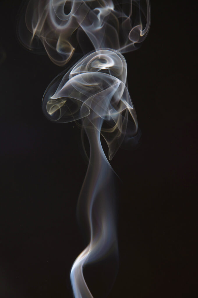 Mesmerizing White Smoke Wallpaper on Dark Background