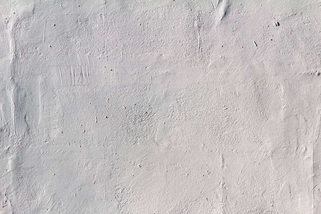 Elegant White Textured Wall: Minimalist Wallpaper Background