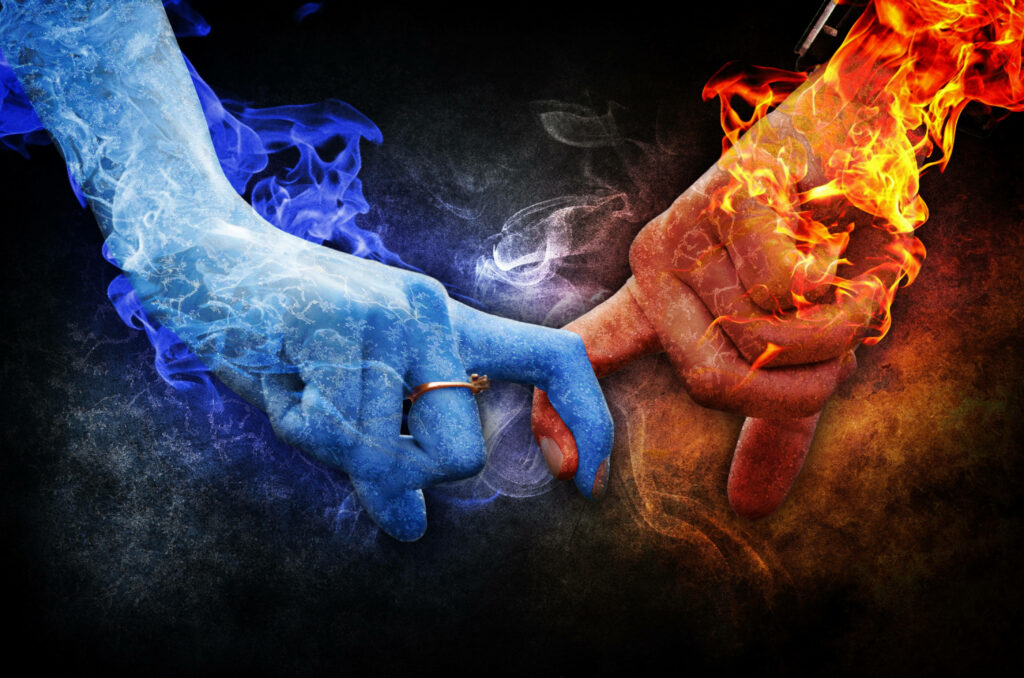 Fiery and Frosty Embrace: Intertwined Hands Create a Striking 4k Fire Background Wallpaper
