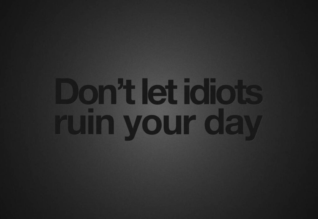 Don't Let Negativity Eclipse Your Journey: Empowering Laptop Background Quote Wallpaper