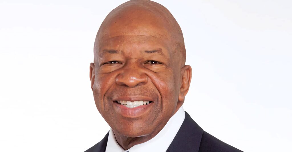 Elijah Cummings professional portrait with warm expression and soft lighting on light background Wallpaper