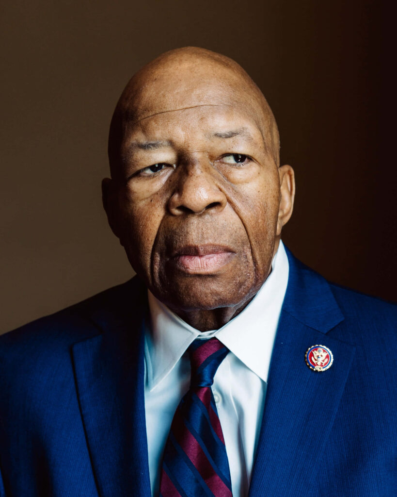 Elijah Cummings portrait wallpaper in blue suit with patterned tie and soft natural lighting