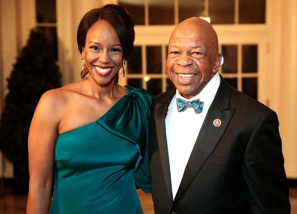 Elijah Cummings and Maya Rockeymoore Cummings smiling in elegant formal attire with classic background Wallpaper