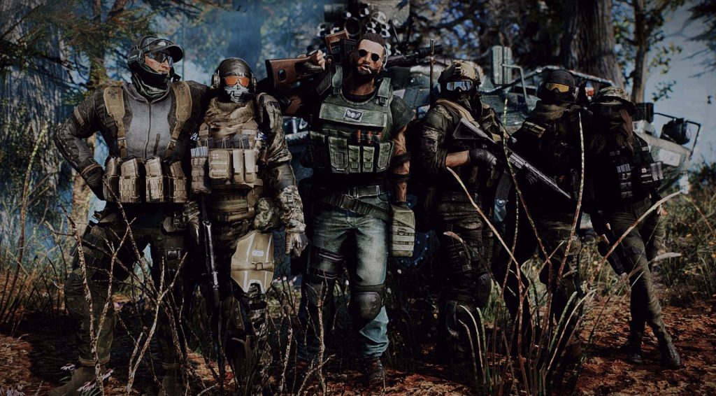 Six elite tactical operators in heavy gear with assault rifles in rugged woodland background Wallpaper