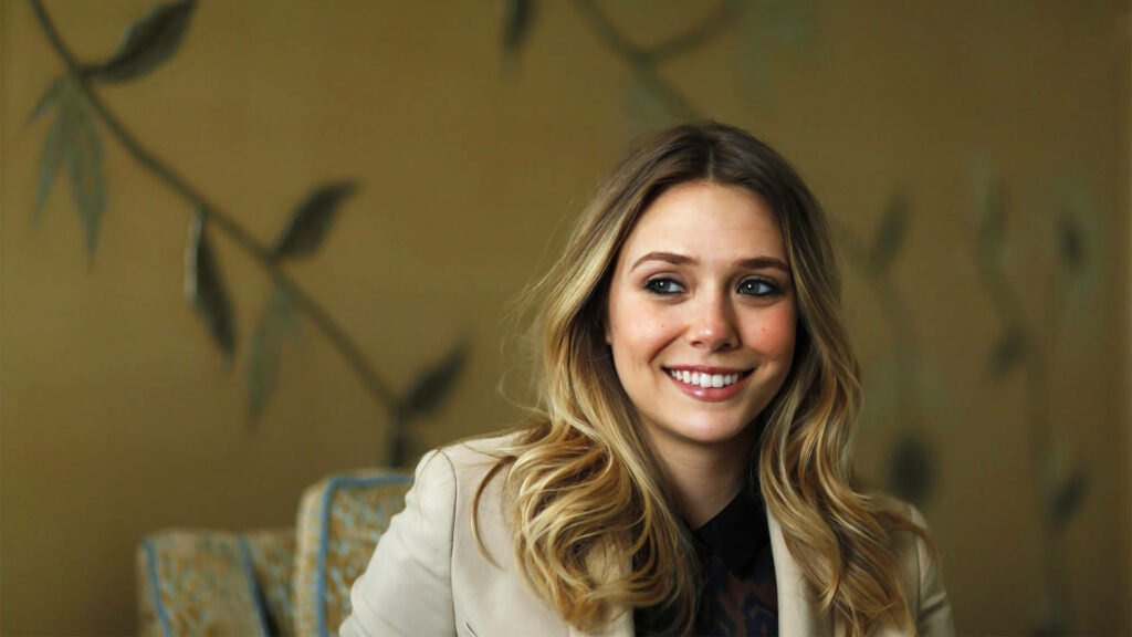 Charming Wallpaper: Elizabeth Olsen's Stunning Smile in a Serene Setting