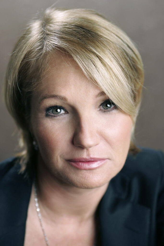 Ellen Barkin portrait wallpaper soft blonde hair expressive green eyes natural confident style