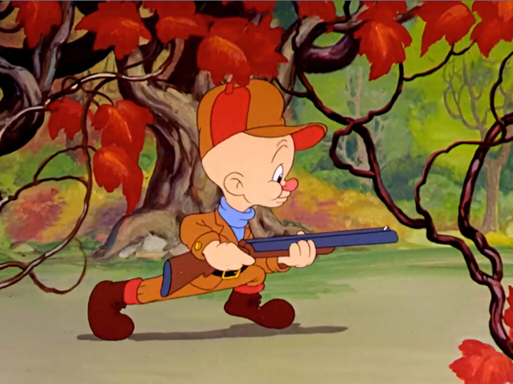 Elmer Fudd cartoon wallpaper sneaking in autumn forest with rifle vivid red leaves background