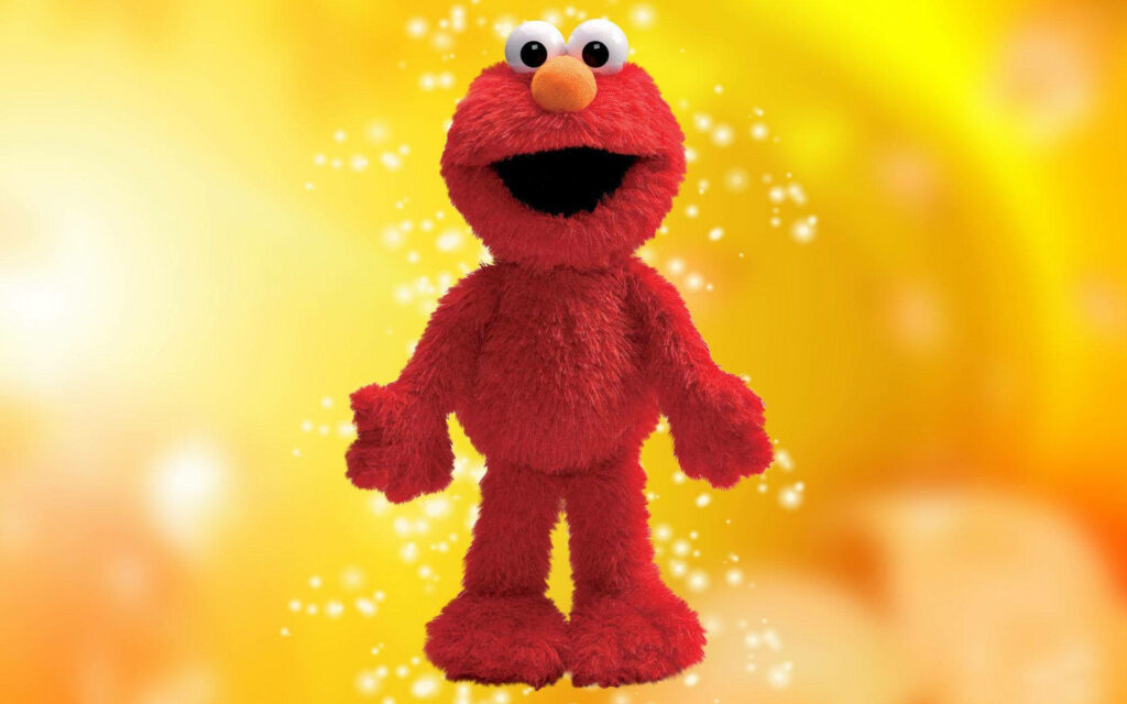 Elmo digital fan art wallpaper with vivid red fur glowing yellow orange bokeh background sparkle