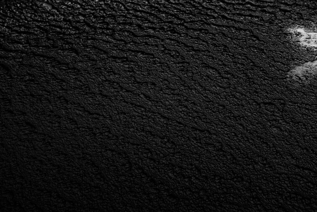 High-Resolution Embossed Black Wallpaper - Dramatic Texture
