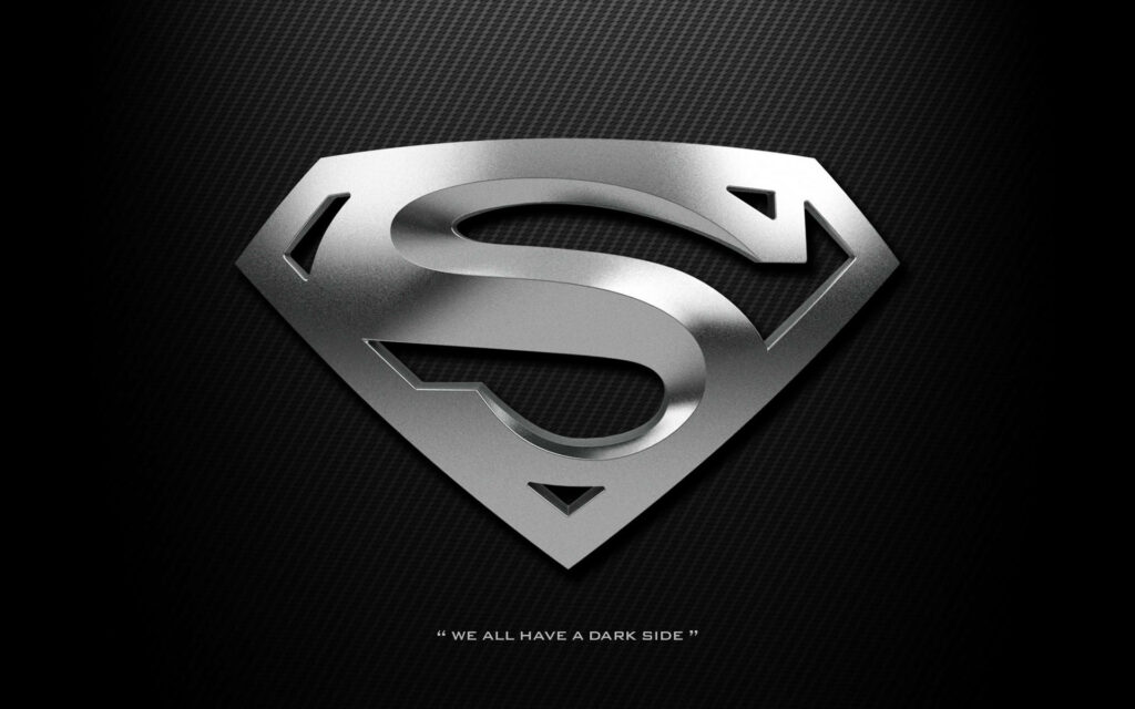 Dark Metallic Superman Logo on Textured Background with Captivating Caption Wallpaper