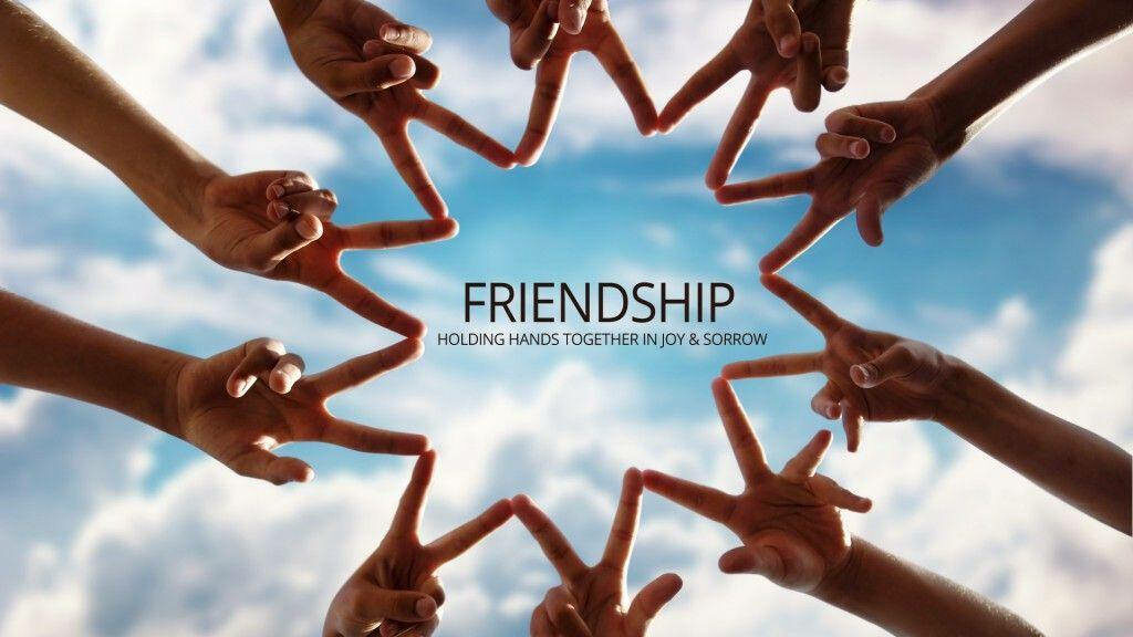 The Symbolic Connection of Friends: A Hand Sign Embracing Friendship Wallpaper