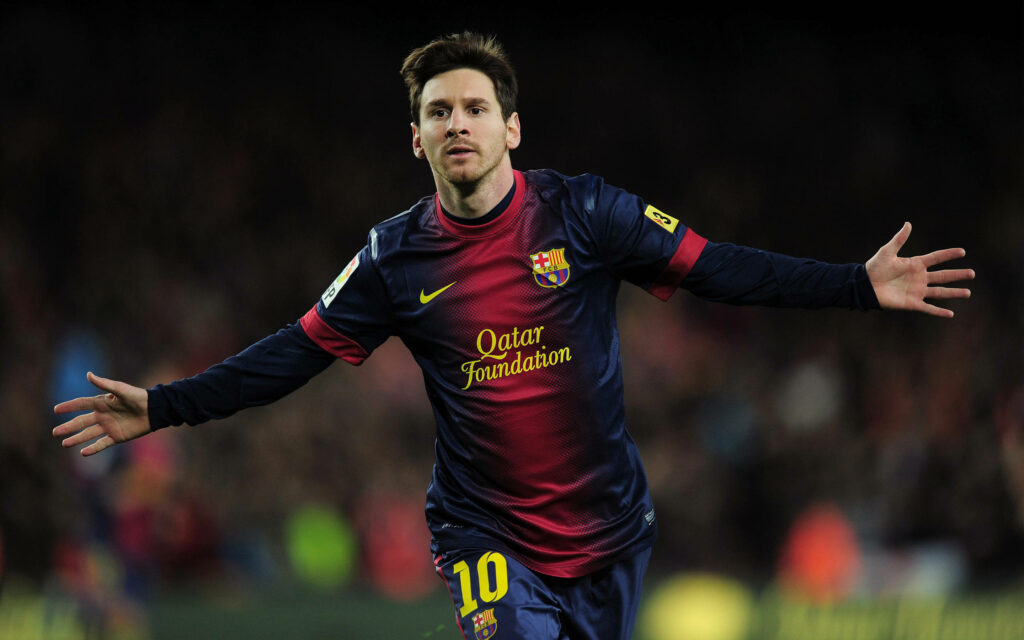 Charging Messi: The Majestic Field Sprint in Ultra HD Glory Wallpaper