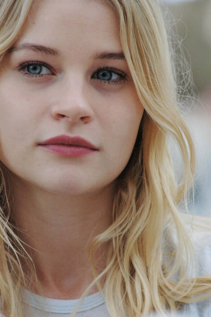 Emilie de Ravin close-up portrait with blonde hair blue eyes soft natural lighting serene expression Wallpaper