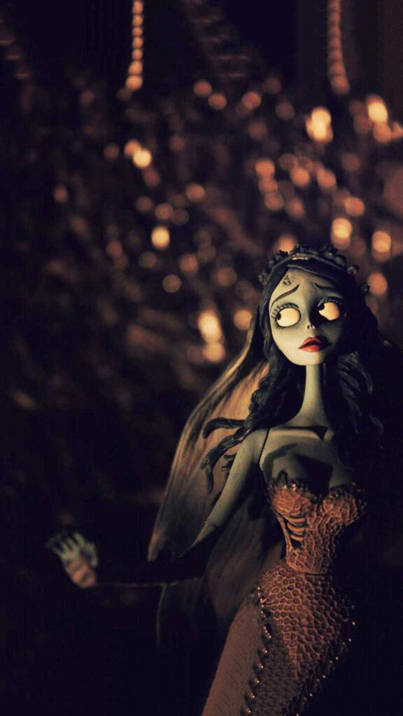 Emily from Corpse Bride in gothic gown with expressive eyes against dark cinematic background Wallpaper