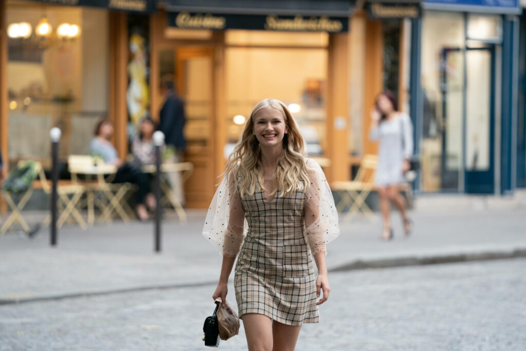 Emily stylishly strolling vibrant charming Paris streets wallpaper background fashion scene