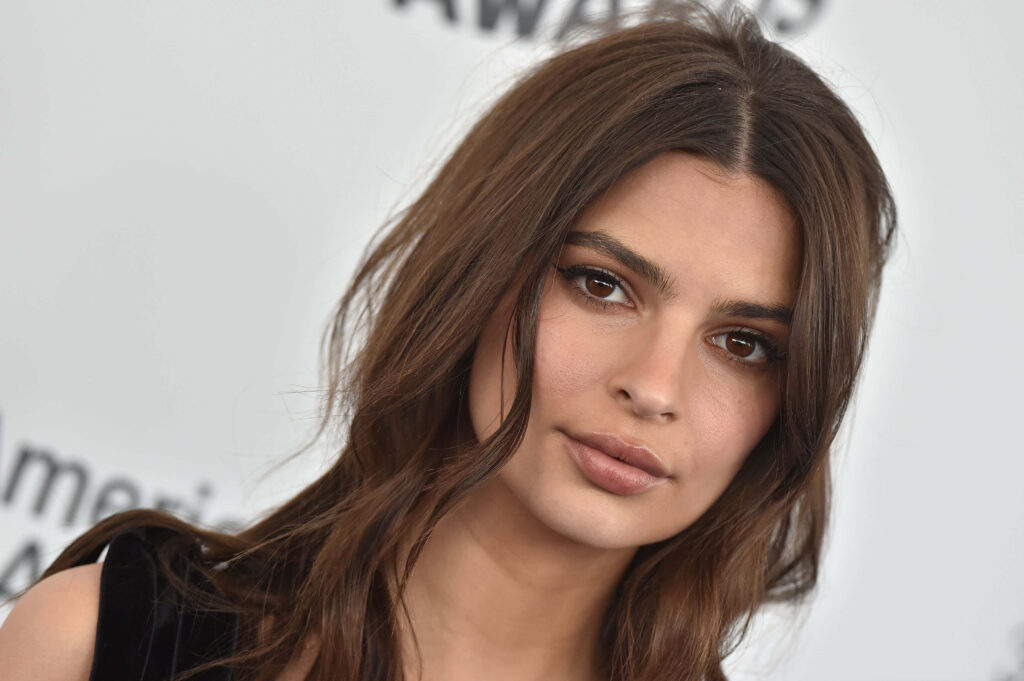 Elegant Emily Ratajkowski: Sophisticated Style Wallpaper Background