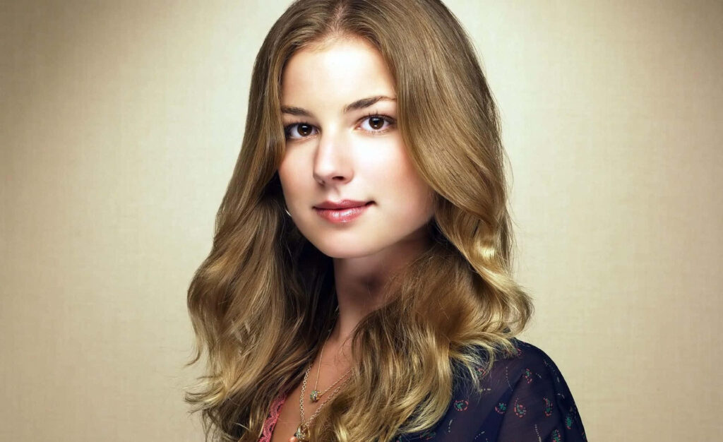 Emily VanCamp portrait with soft curls and gentle expression on neutral background wallpaper