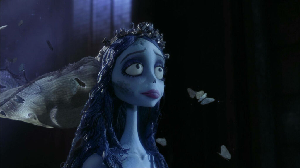 Emily the Corpse Bride in moonlit gothic scene with blue skin flowing hair delicate butterflies Wallpaper
