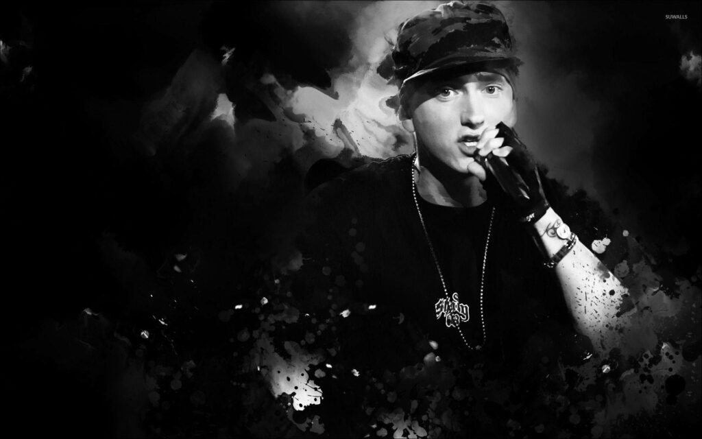 Black and white Eminem illustration wallpaper with intense performance and bold artistic splatter effects