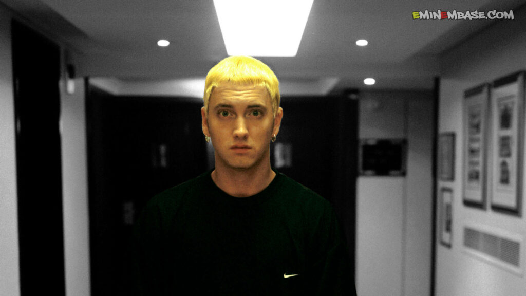 Eminem as The Slim Shady in dimly lit hallway with blonde hair intense expression wallpaper
