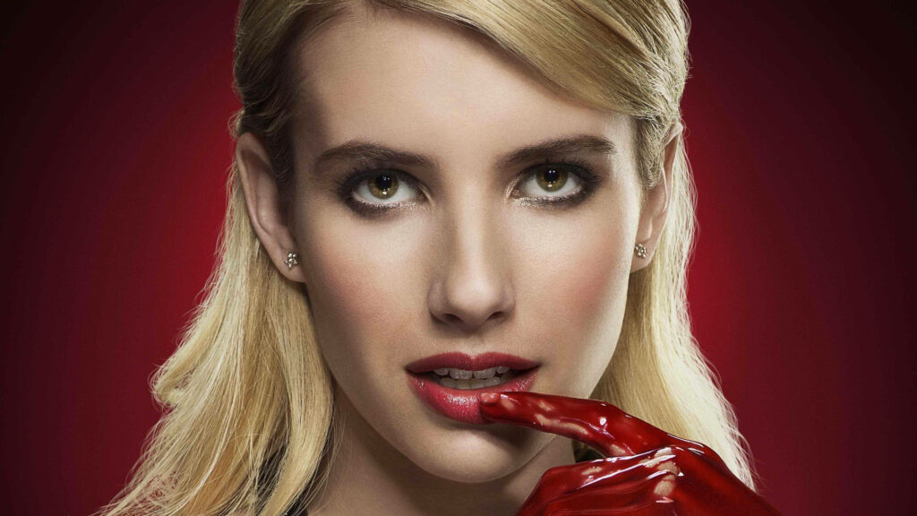 Emma Roberts Scream Queens wallpaper with slicked-back blonde hair intense gaze red glove lips
