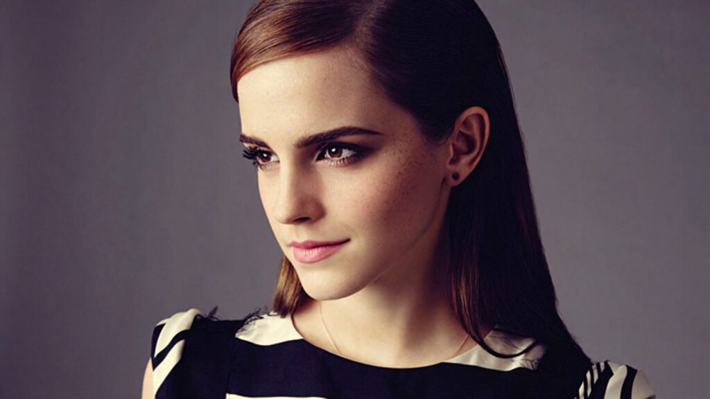 Emma Watson portrait wallpaper with soft lighting neutral background elegant poised look
