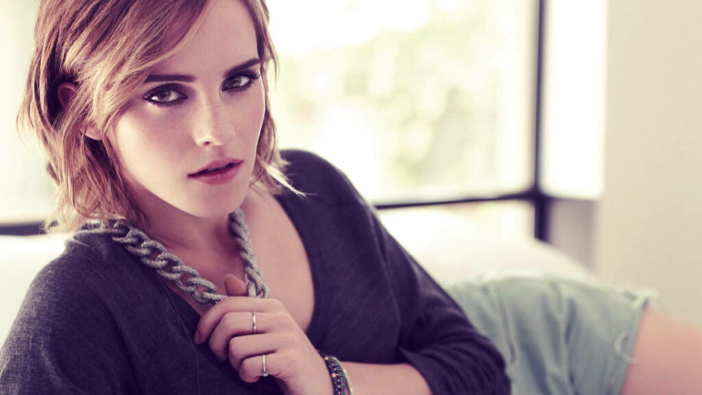 Emma Watson portrait in modern setting with soft lighting neutral tones and natural makeup wallpaper